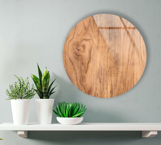 Showcasing the abstract quality of light brown wooden round glass wall art as captivating home decor, enhanced by a glossy finish on the wood grain.