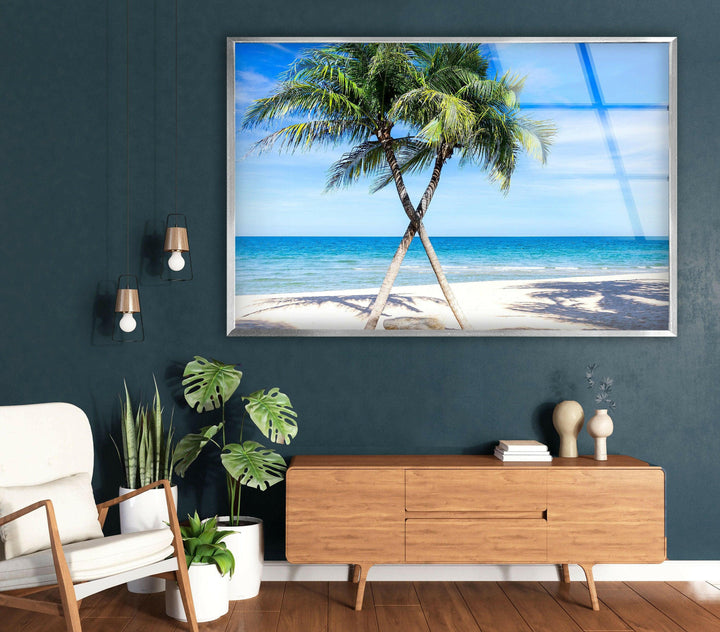 Beautiful tropical landscape with palm trees casting shadows on the soft sand, ideal for home decor.

