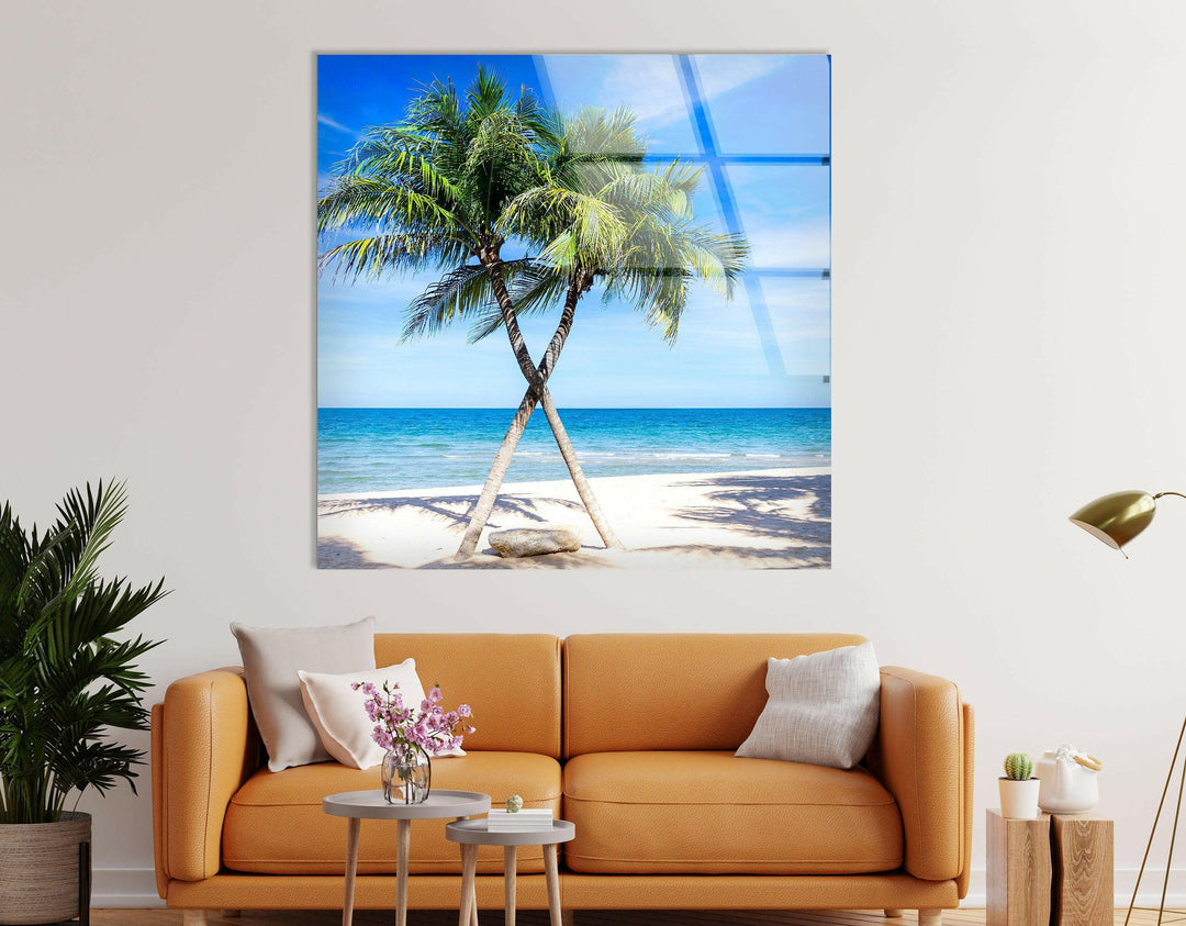 Modern glass artwork featuring a peaceful island setting with blue skies and lush palm trees.
