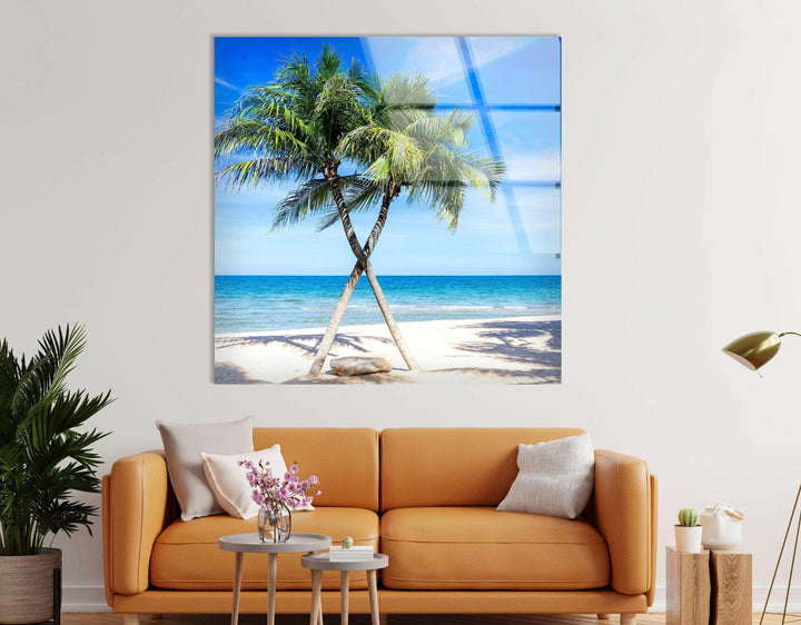 Modern glass artwork featuring a peaceful island setting with blue skies and lush palm trees.

