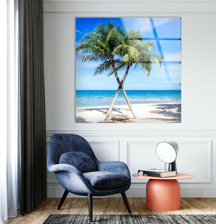 Stunning ocean scenery with a pair of palm trees leaning toward the sea, creating a vacation vibe.

