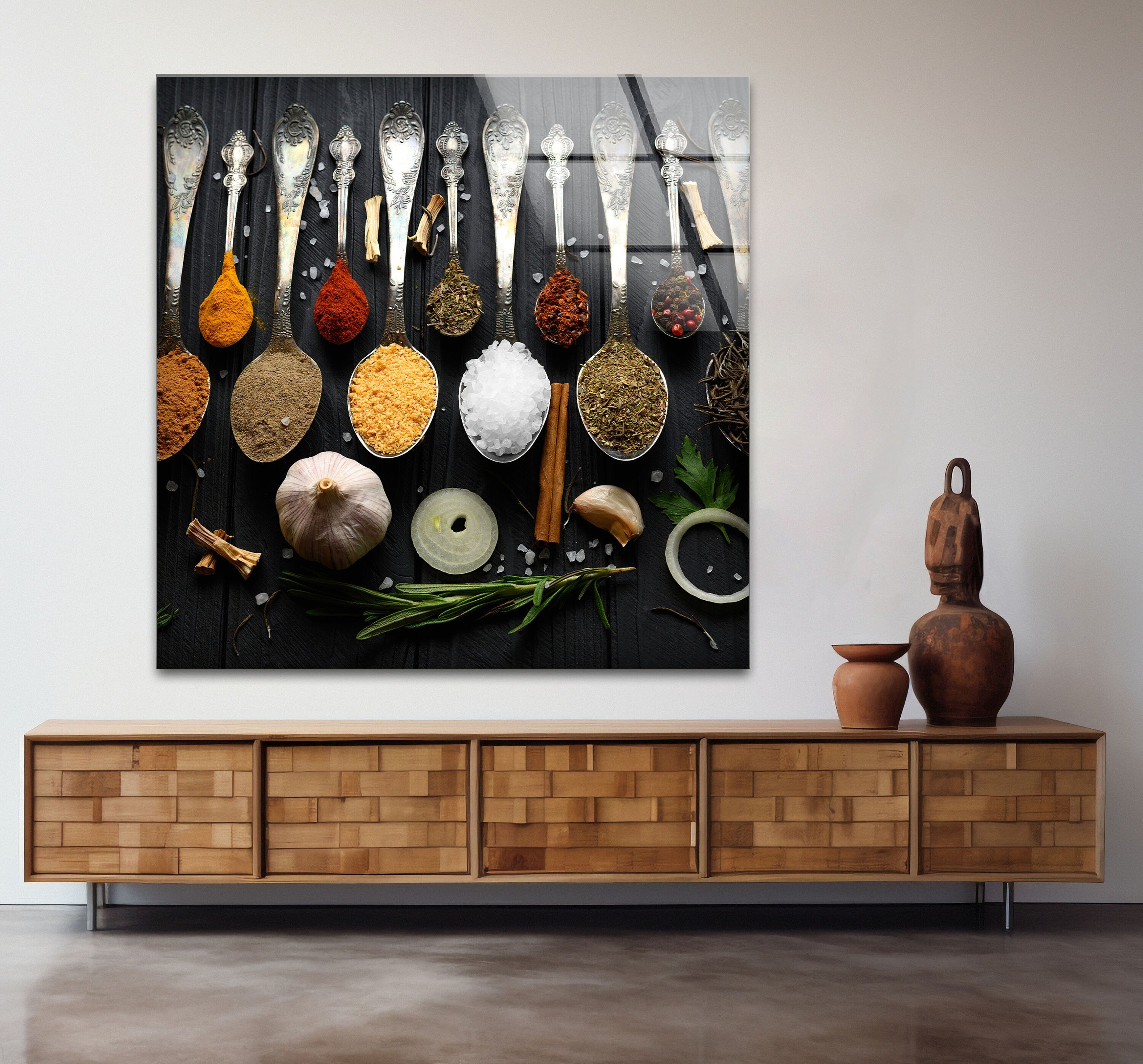 a picture of spices and spoons hanging on a wall