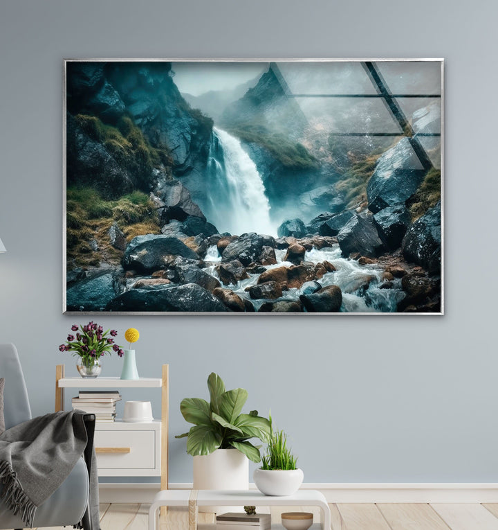 Stunning waterfall art print on glass, showcasing the peaceful flow of water amidst a misty landscape.
