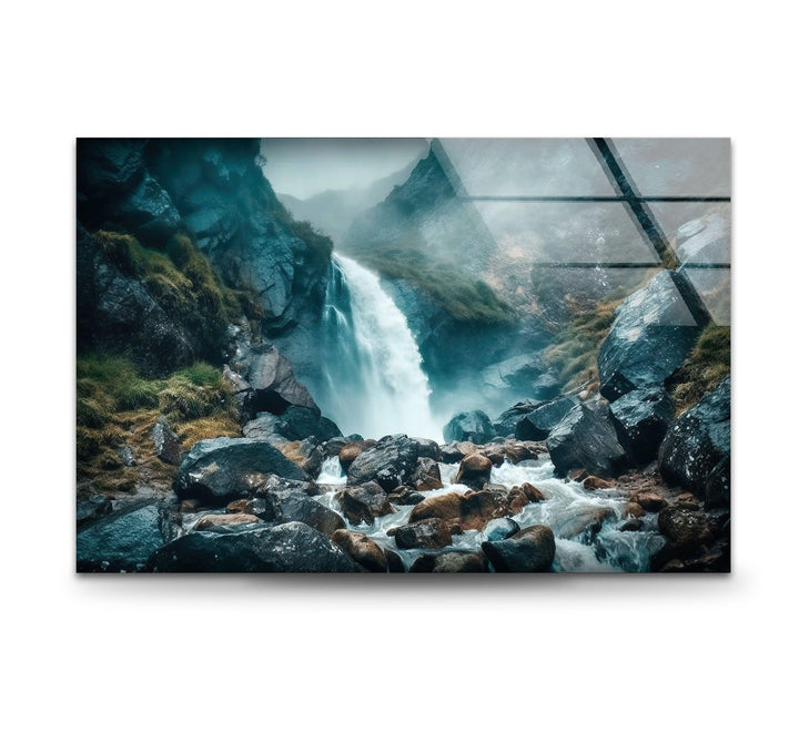 Beautiful nature-inspired glass artwork of a powerful waterfall flowing in the mist.
