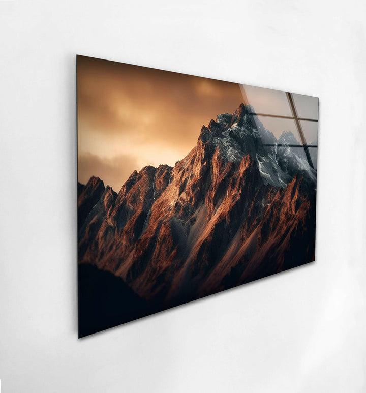 A breathtaking view of towering peaks in a glass wall art piece that adds elegance to any room.
