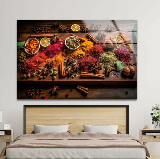 Horizontal glass wall art displaying a vibrant arrangement of colorful spices above a bed for modern kitchen decor.