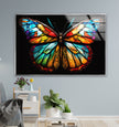 a painting of a colorful butterfly on a wall