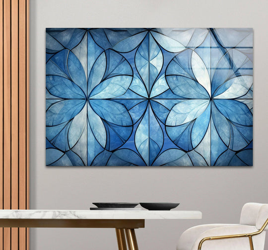 A tranquil blue geometric glass wall art piece in abstract home decor evokes a sense of calm.