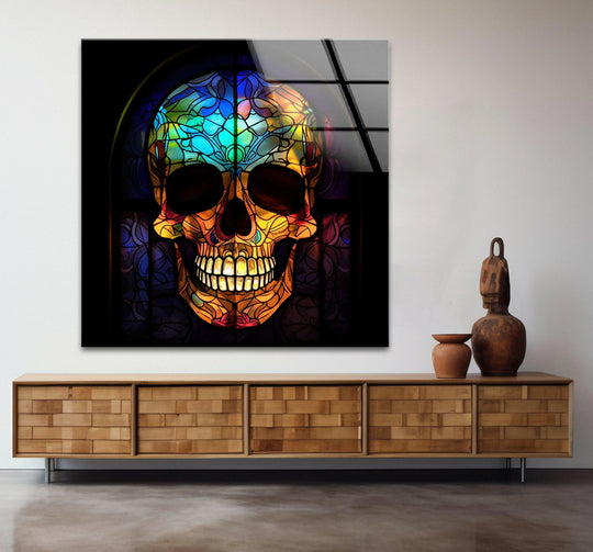 Colorful stained-glass style skull art prints with abstract floral patterns, showcasing a vibrant spectrum of blues, greens, oranges, and yellows.
