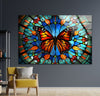 a painting of a colorful butterfly on a gray wall