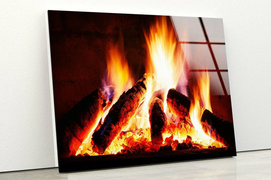 Close-up of a vibrant fire flame glass wall art with a smooth, reflective surface texture.