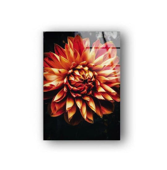 A close-up glass art painting of a vibrant orange dahlia in full bloom evokes a mood of bold warmth and natural elegance.