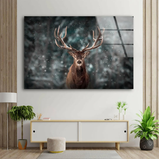 Deer in Snow Forest glass wall art shows a brown stag and winter forest decor and is vivid nature art for animal wall art and winter forest scene