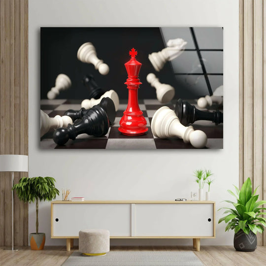 A dramatically lit red queen stands victorious on a chessboard amid fallen black and white pieces, captured in realistic detail for home decoration.