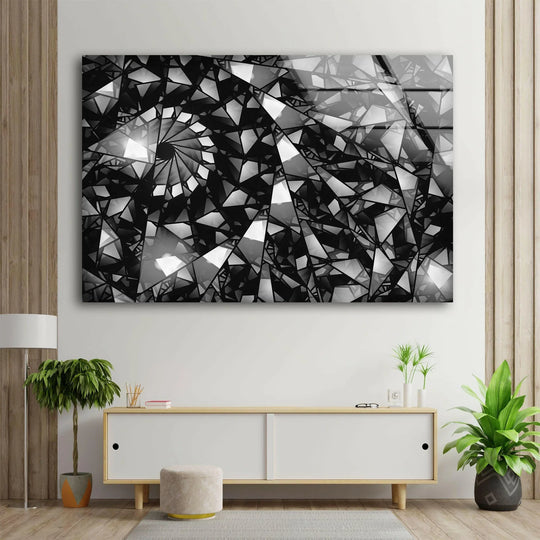 Detailed black and white abstract glass wall art featuring a fragmented, geometric pattern resembling a stained church window.
