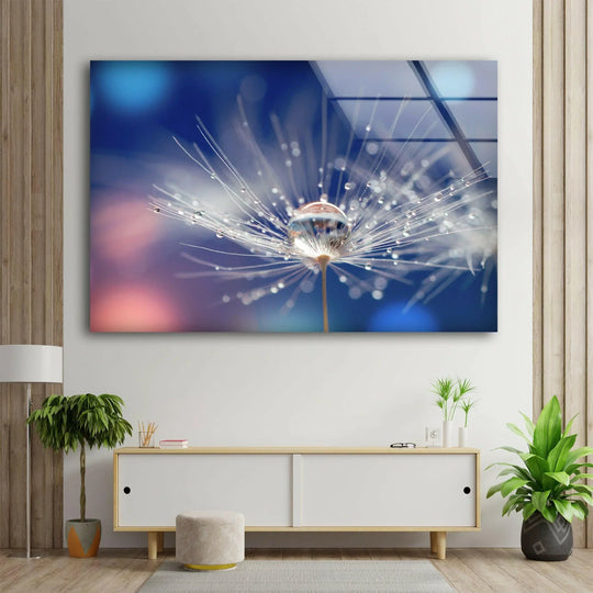 A single dandelion seed disperses in a gust of wind, with shimmering dew drops capturing the movement in this stunning print wall art.