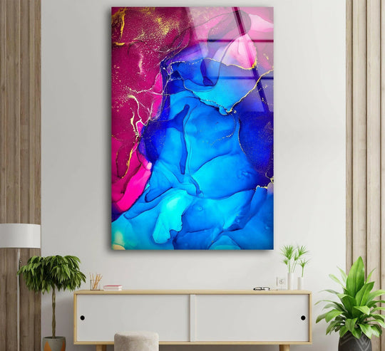 Vivid pink alcohol ink art glass wall art prints feature swirling textures of sapphire blue and magenta with shimmering gold veins.