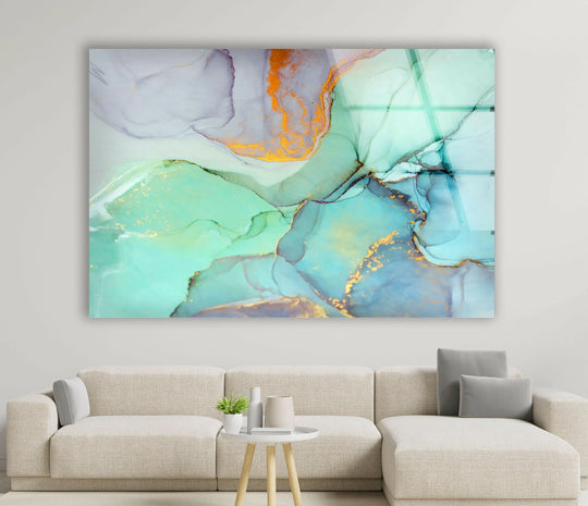Organic forms flow and swirl in shades of aqua and lavender with golden accents in this stunning hanging wall art.