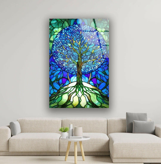 A stained glass art painting depicts the tree of life transitioning from deep blues and purples to vibrant greens.