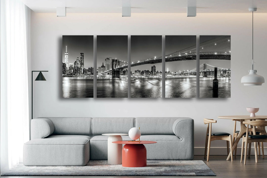 Elegant monochrome artwork of the NYC skyline with shimmering reflections under the Brooklyn Bridge.