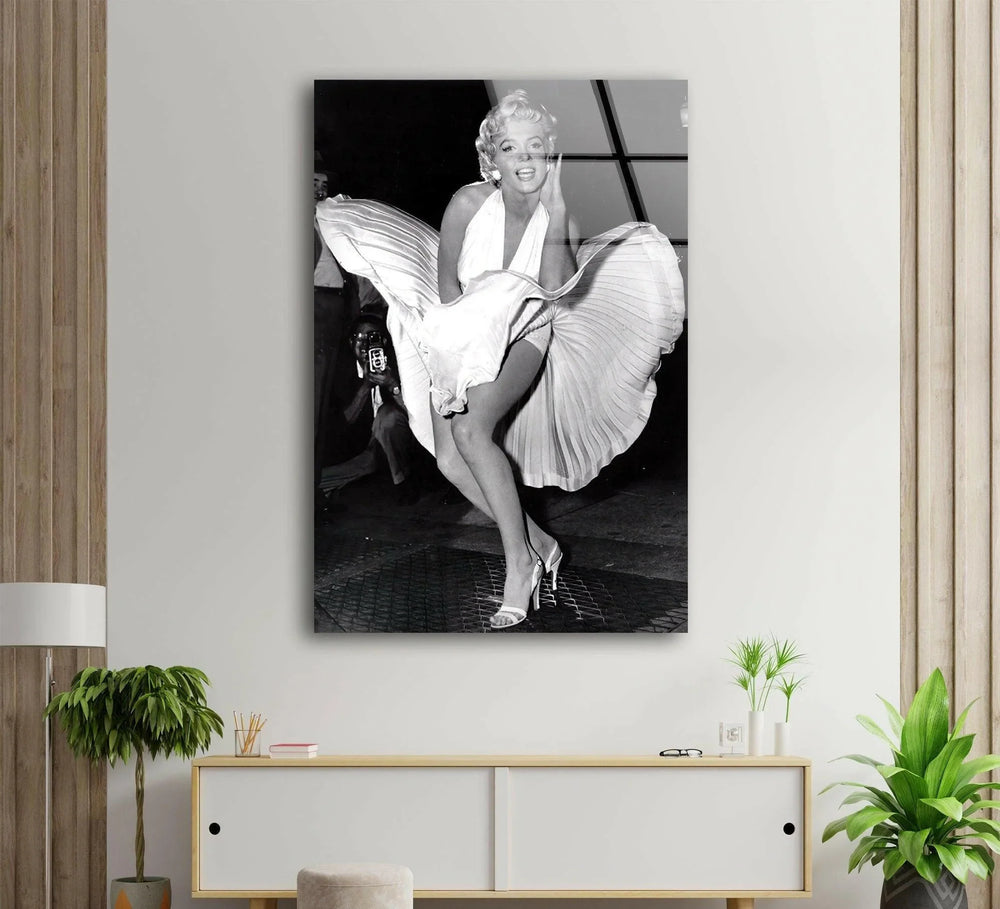 Black and white glass wall art of Marilyn Monroe in her iconic billowing dress pose.