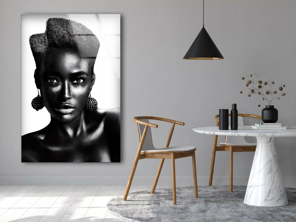 Elegant monochrome portrait of a woman with sculpted afro hair on premium glass wall art.