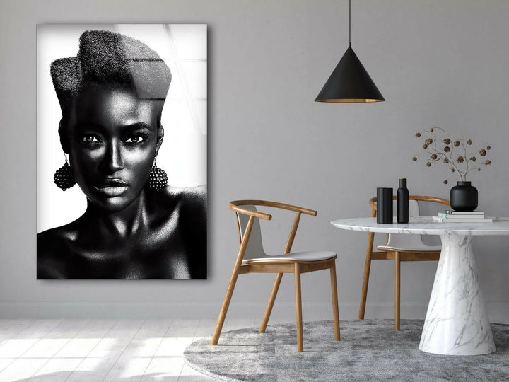 Elegant monochrome portrait of a woman with sculpted afro hair on premium glass wall art.