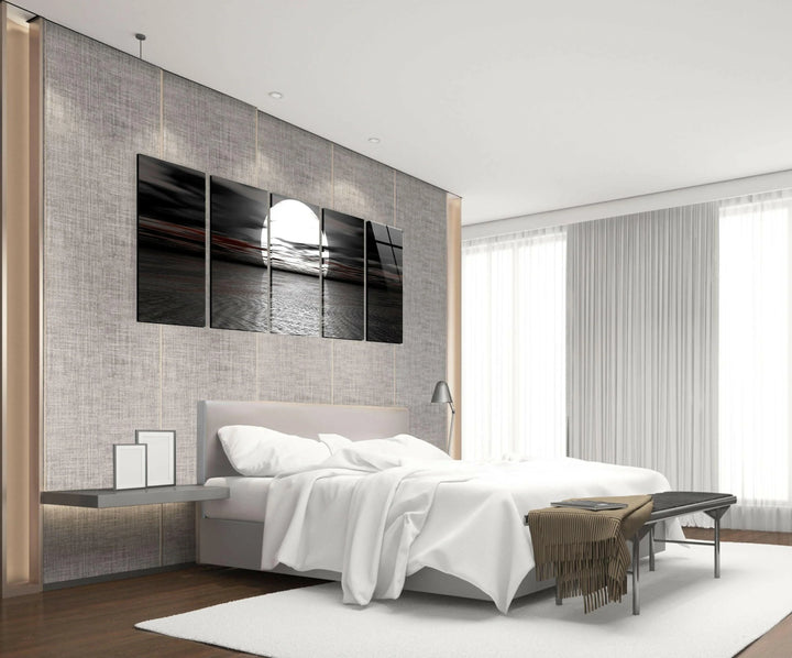 Atmospheric moonlit ocean scene printed on sleek glass wall art.