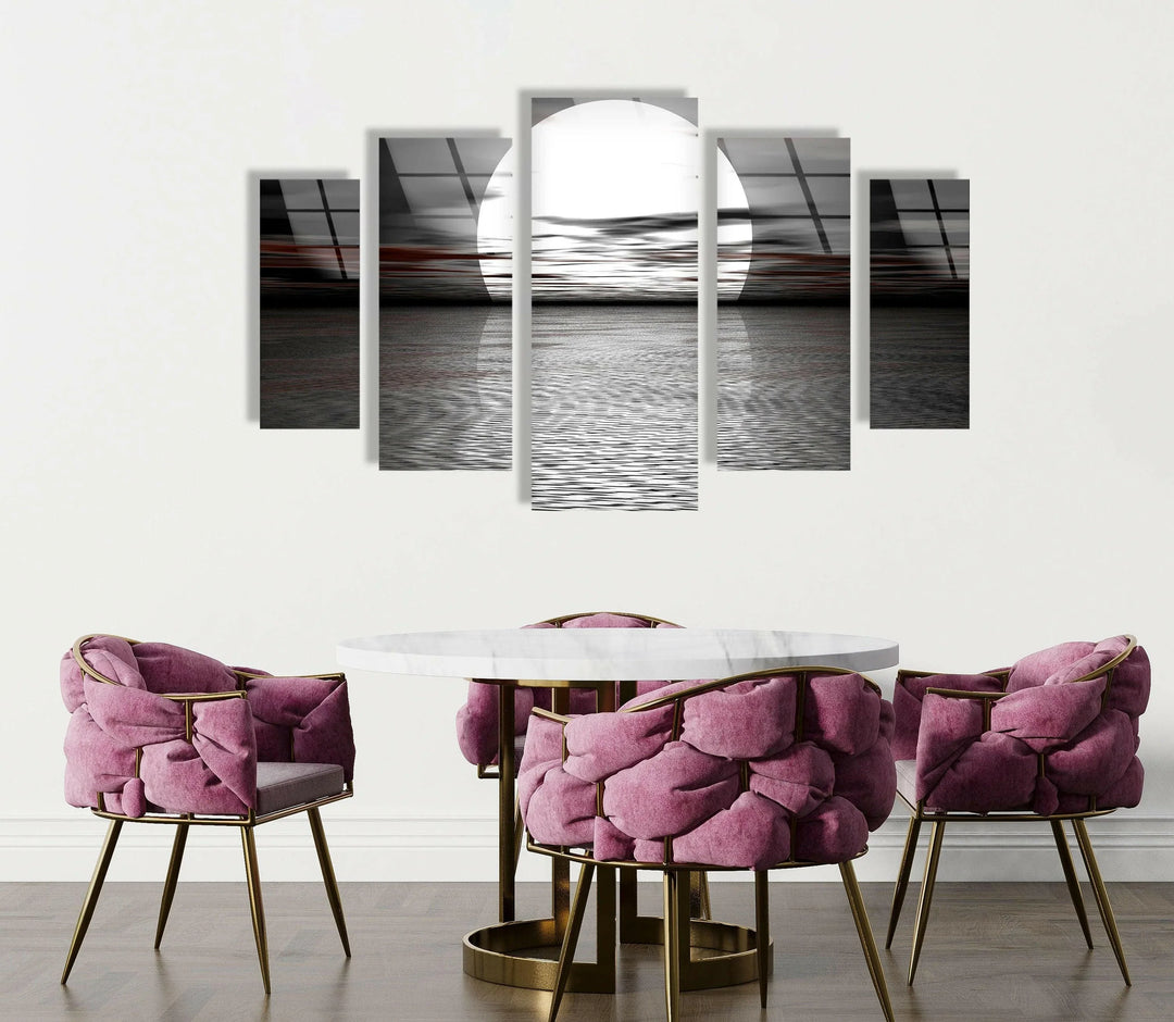 High-contrast seascape with a luminous moon illuminating the water’s surface.