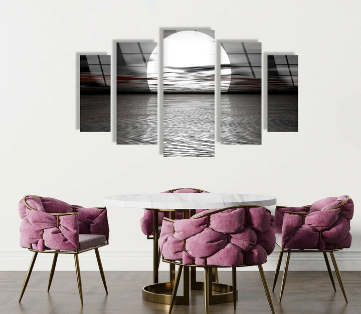 High-contrast seascape with a luminous moon illuminating the water’s surface.