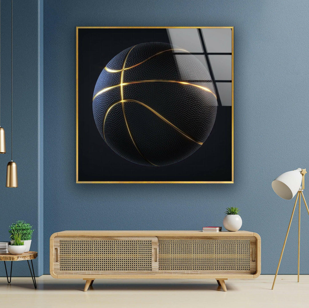 Glass wall art showcasing a detailed basketball with luminous gold lines on a dark field- MyPhotoStation