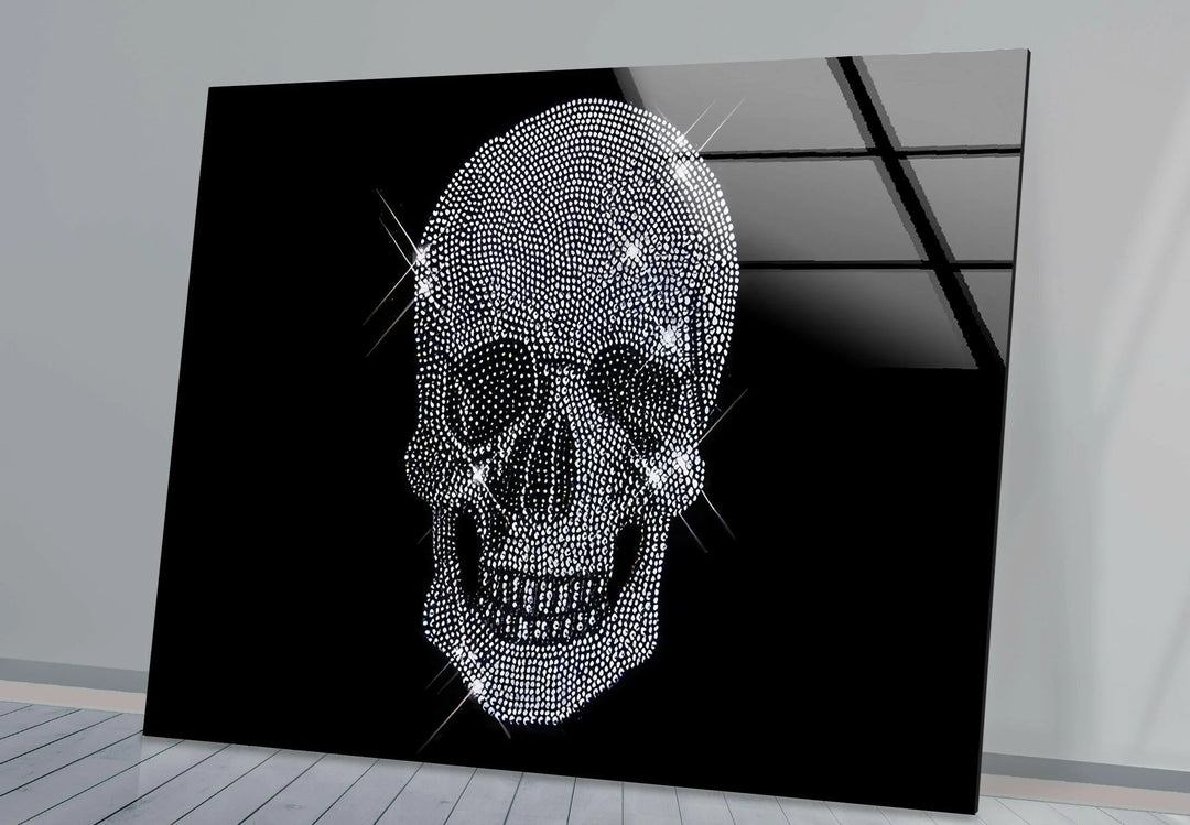 Glass panel artwork presenting a dazzling crystal skull illuminated against deep black.