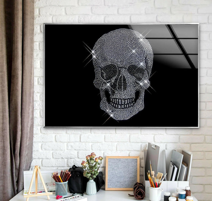 Black and white glass wall art featuring a sparkling crystal-studded skull on a dark background.